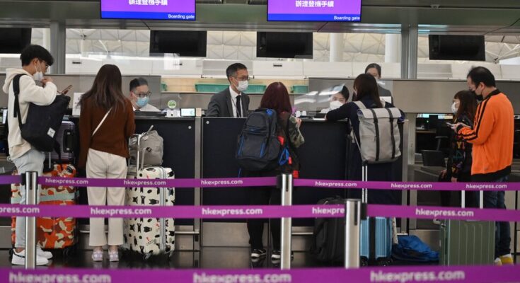China ends quarantine for overseas travellers amid surges in Covid cases
